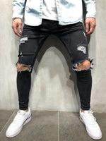 Black Ripped Knee Out Skinny Jeans